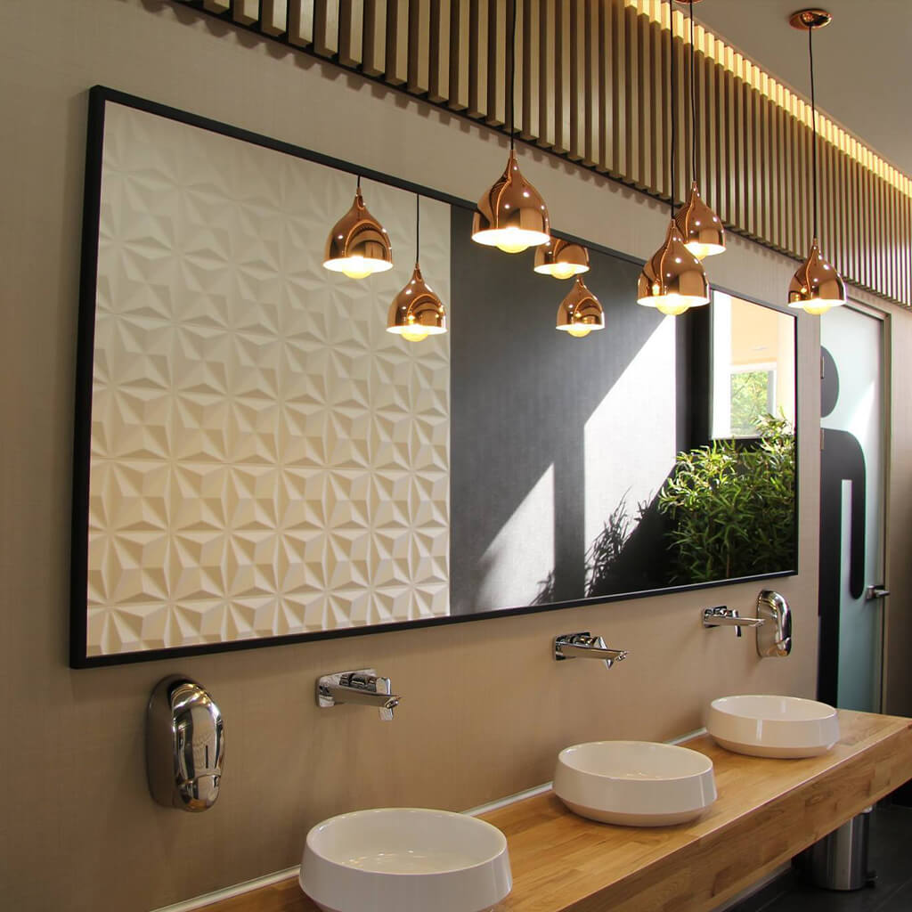 Within a hotel bathroom the Cullinans 3D wall panels are used to create a contemporary interior.