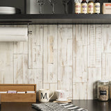 Light wood peel and stick panelling applied to a kitchen