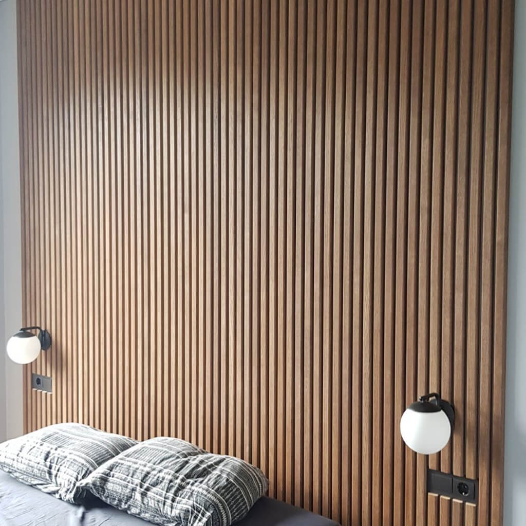 A large bed headboard has been installed here using the flutes.