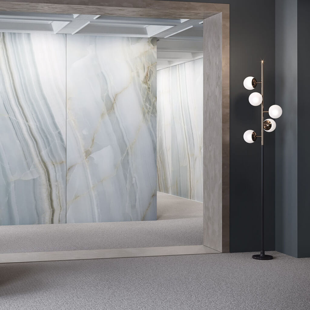 A marble effect wall panel installed within a corridor.