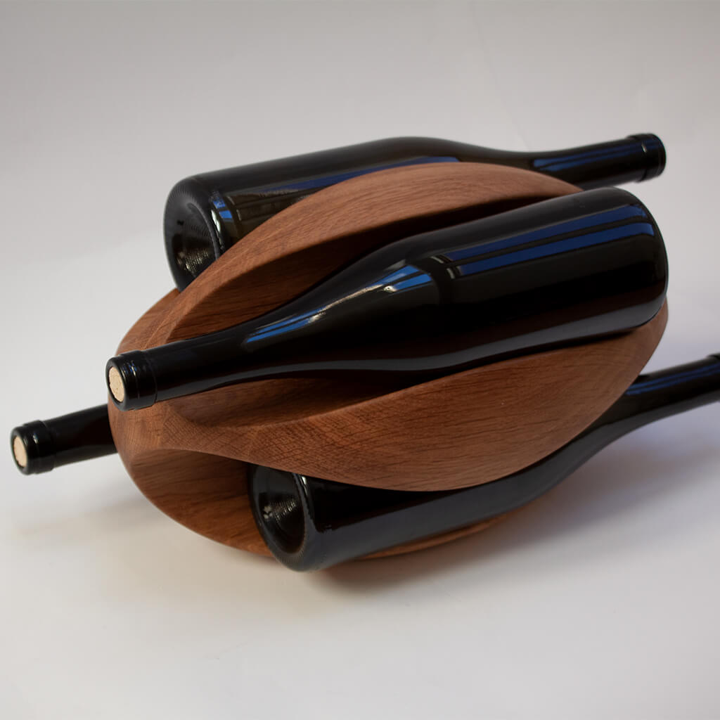 The Rugby wooden wine rack holding 4 red wines.