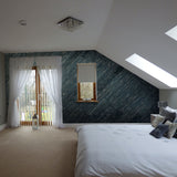 Blue finished wooden peel and stick panels used as a feature wall within a bedroom
