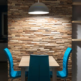 Behind a small kitchen dining room is the beautifully textured 3D reclaimed wooden wall panels. 