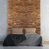 Woll wall panels are used as a feature behind a king sized bed.
