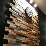 Reclaimed wood wall used within a games room behind a dartboard. It shows what a great effect is achieved simply by adding a small amount of the Largo panel.