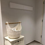 Image of the white wall mounted airer neatly closed away in a laundry room.