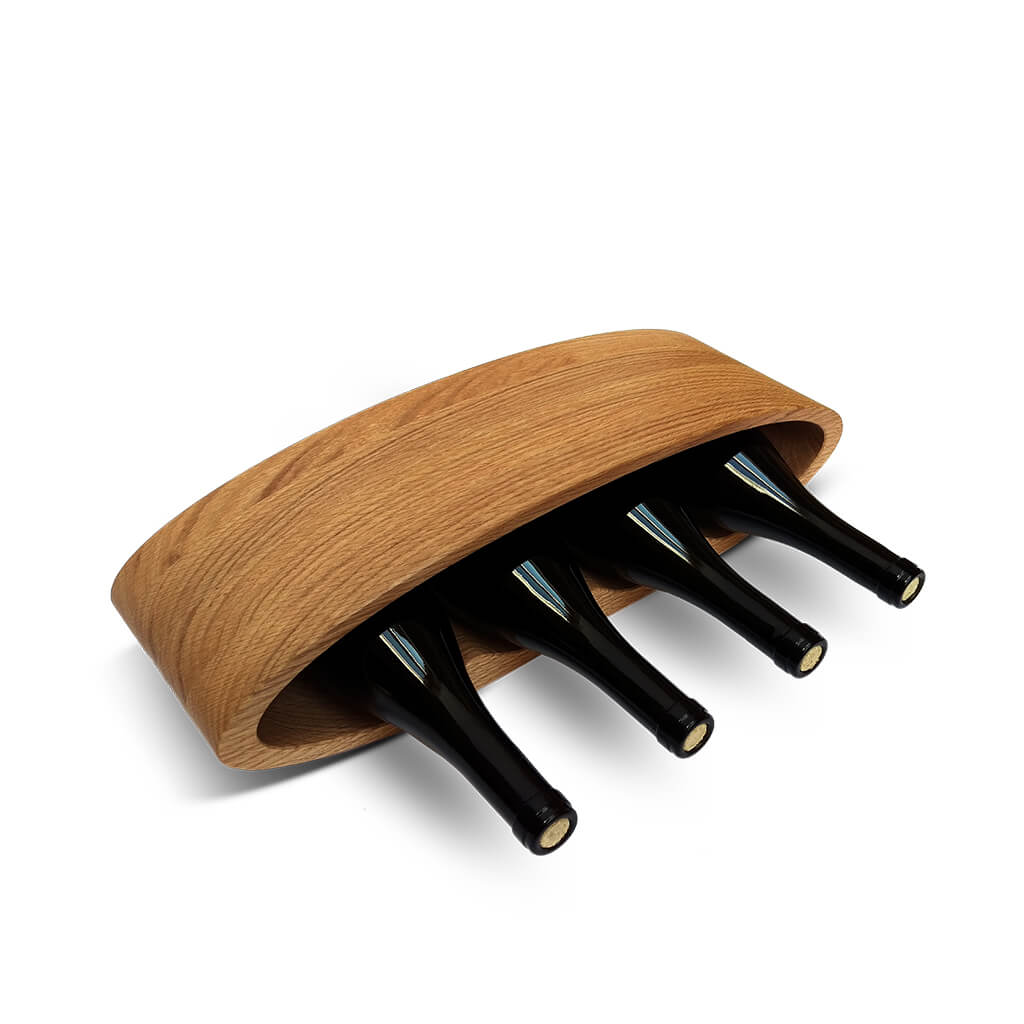 Image of the Ellipse wine rack with 4 bottles of red wine inside.
