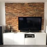 A media wall where the Aglona wooden panels are used behind a white unit with a TV on it.