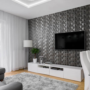 A grey living room where the back wall includes the Latgale wall panels. These panels are a grey wood in a 3D square design.